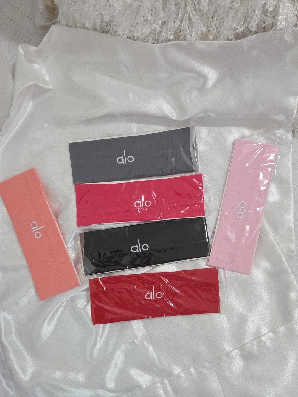 ALO Style Yoga Fabric Resistance Band in oral, Hot Pink, Light Pink, Black, Gray